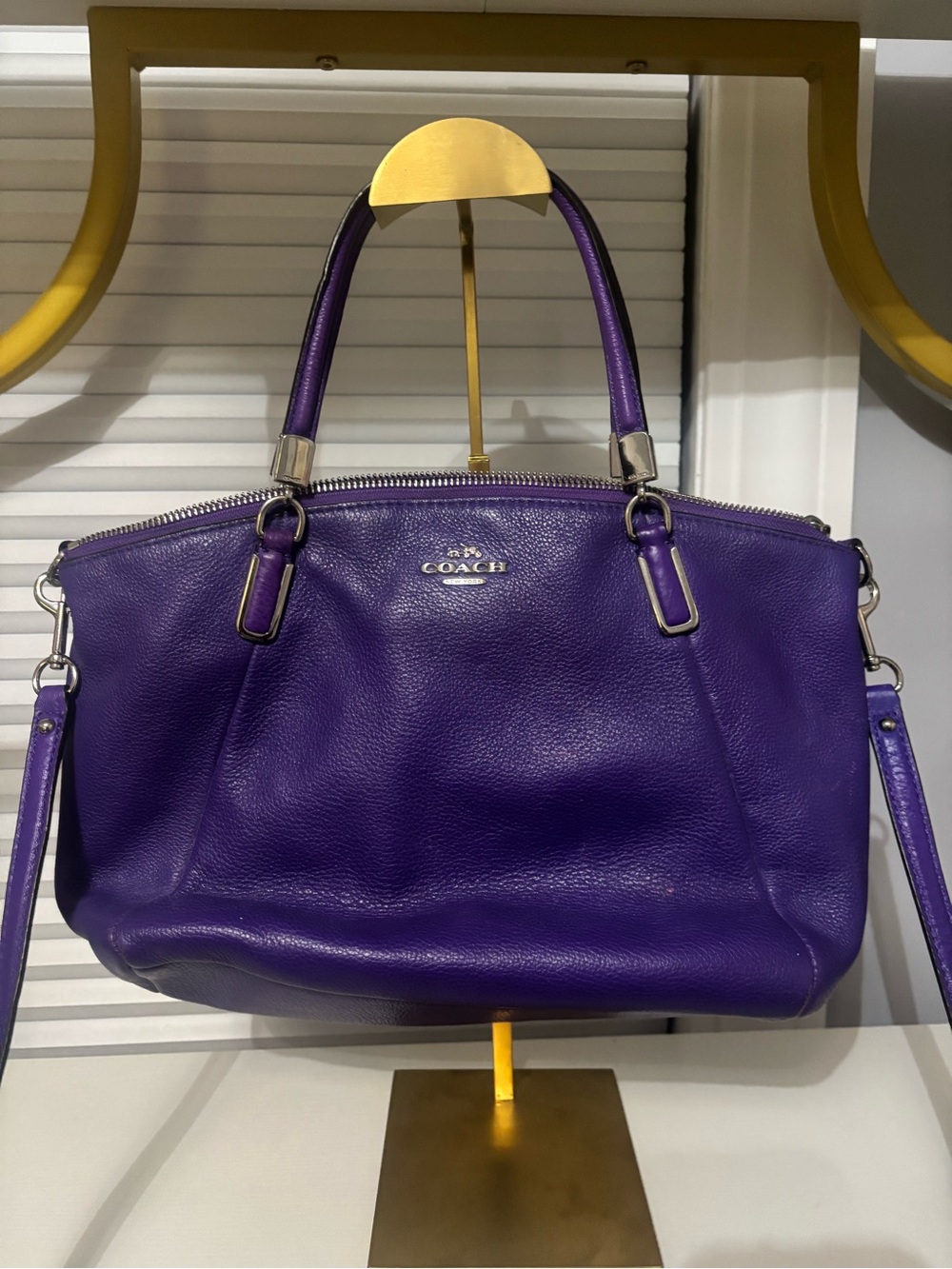 Coach Small Kelsey Satchel in purple pebbled leather.
